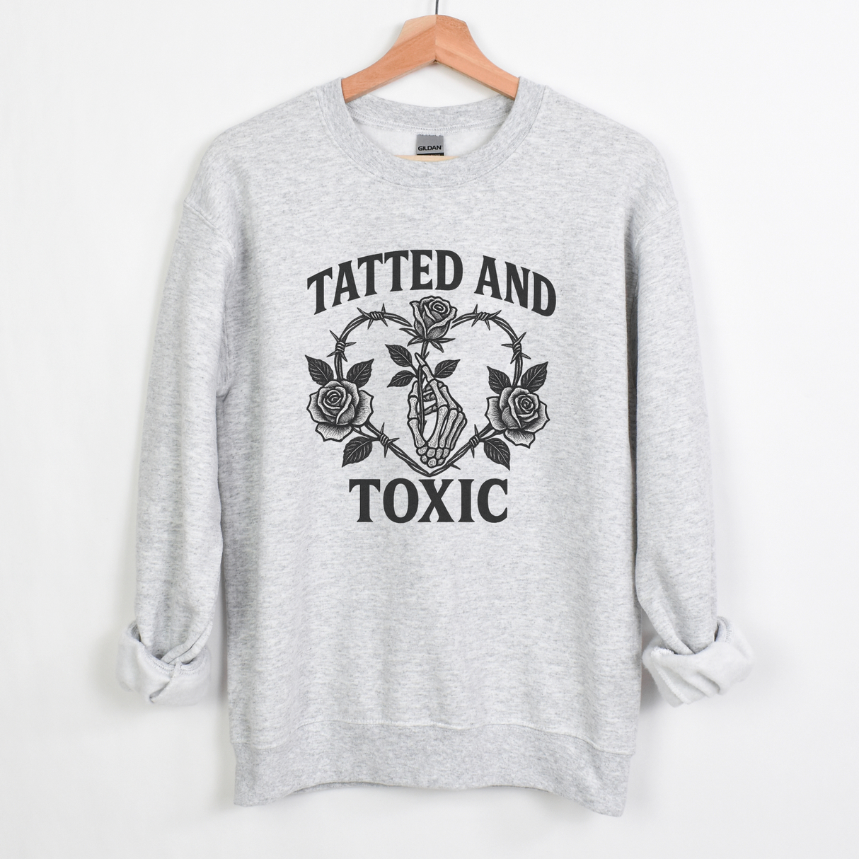 TATTED AND TOXIC WITH HAND AND ROSE
