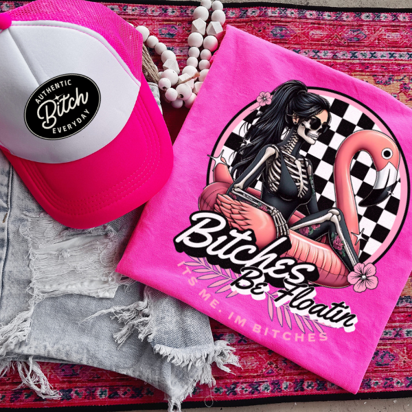 ***EXCLUSIVE***Bitches Be Floating" Neon Tee + "Authentic Bitch" Trucker Hat