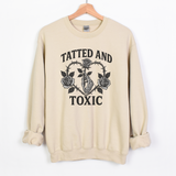 TATTED AND TOXIC WITH HAND AND ROSE
